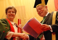 Ms Rachel Lomax receives the Honorary Fellowship from Sir Emyr Jones Parry.